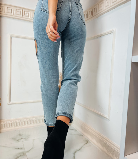 Spodnie jeansowe z fantazyjnym pęknięciem po bokach nogawek 1
